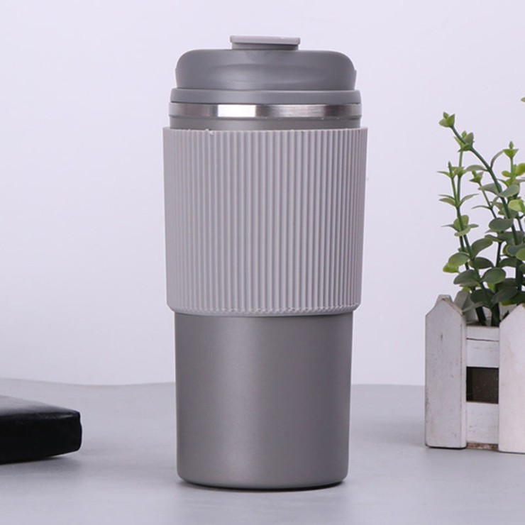 Portable stainless steel vacuum insulated coffee cup