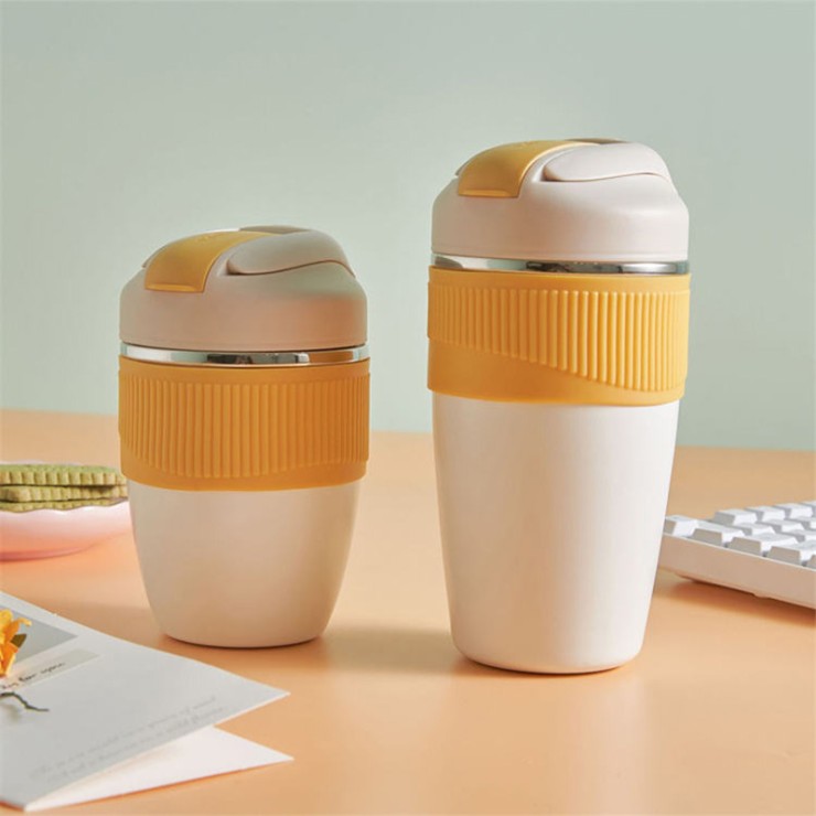 Stylish vacuum insulated coffee cup