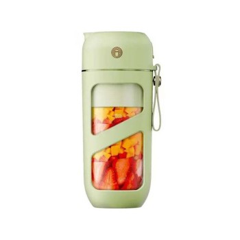 Green mini vacuum electric fruit juicer