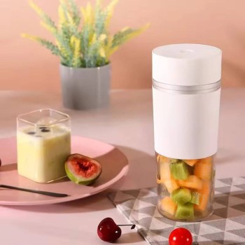 Portable white household electric juicer