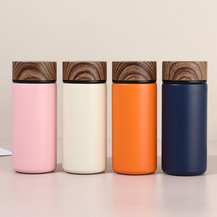 Wood grain vacuum insulated portable thermos cup