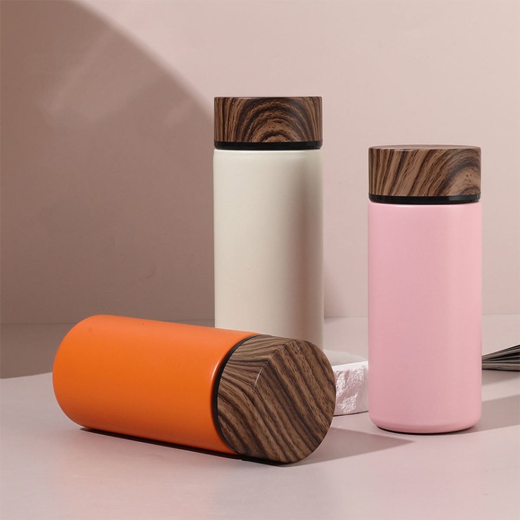 Wood grain vacuum insulated portable thermos cup